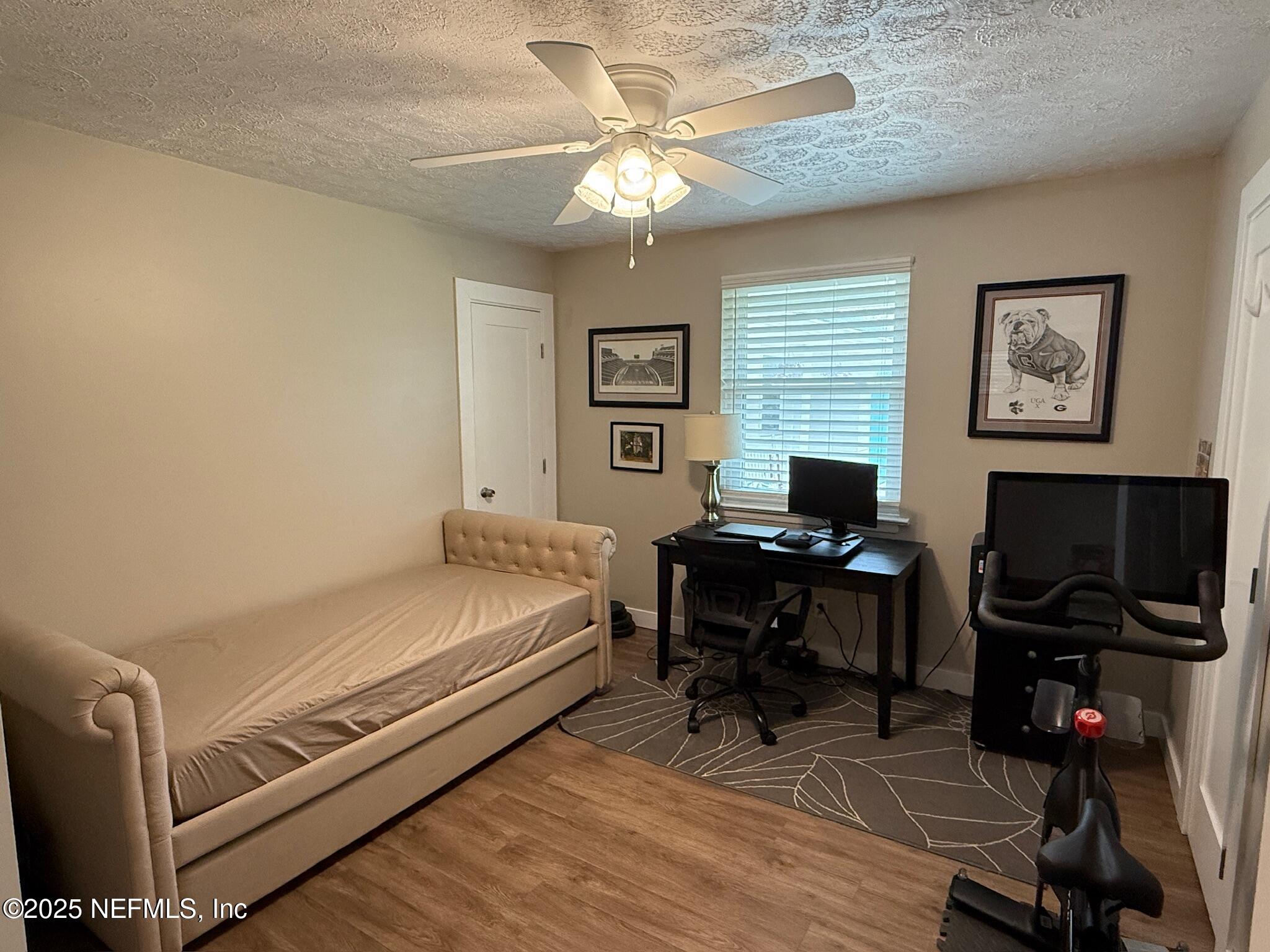 716 Oak Street Neptune Beach, FL 32266 - Photo 17 of 23 a room with a desk and a workspace