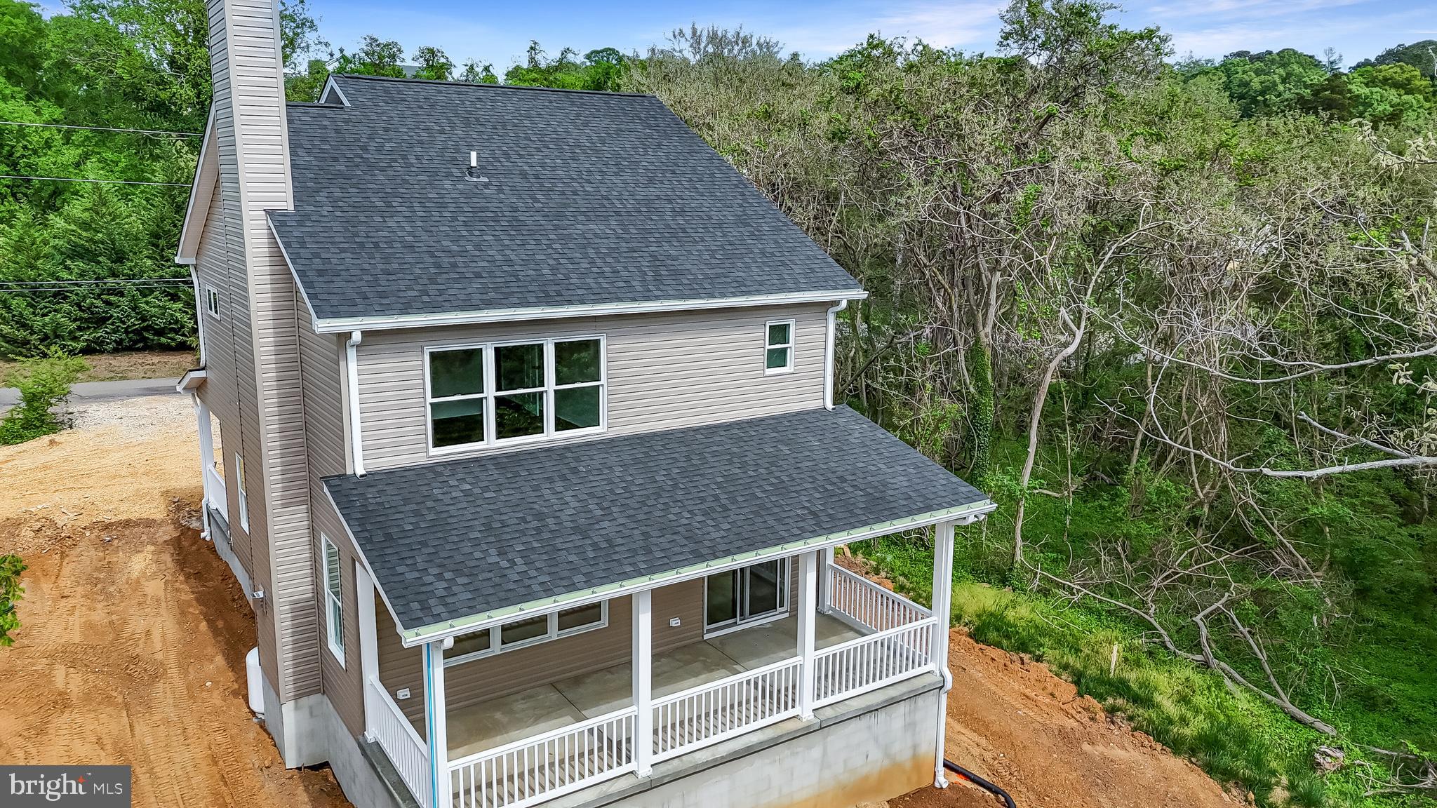 23131 Meadow Road Bushwood, MD 20618 - Photo 20 of 42 a house with trees in the background