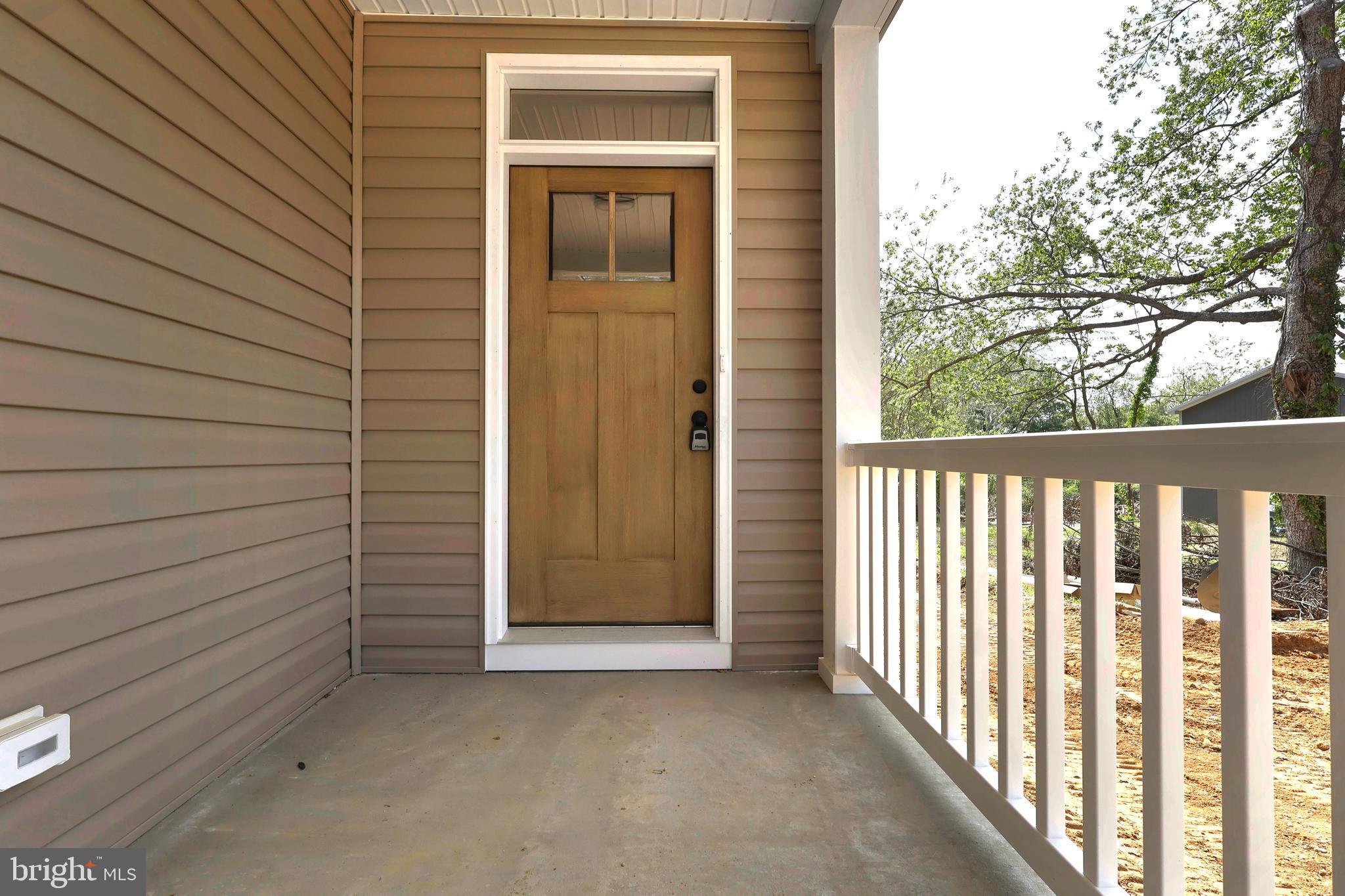 23131 Meadow Road Bushwood, MD 20618 - Photo 28 of 42 a view of front door