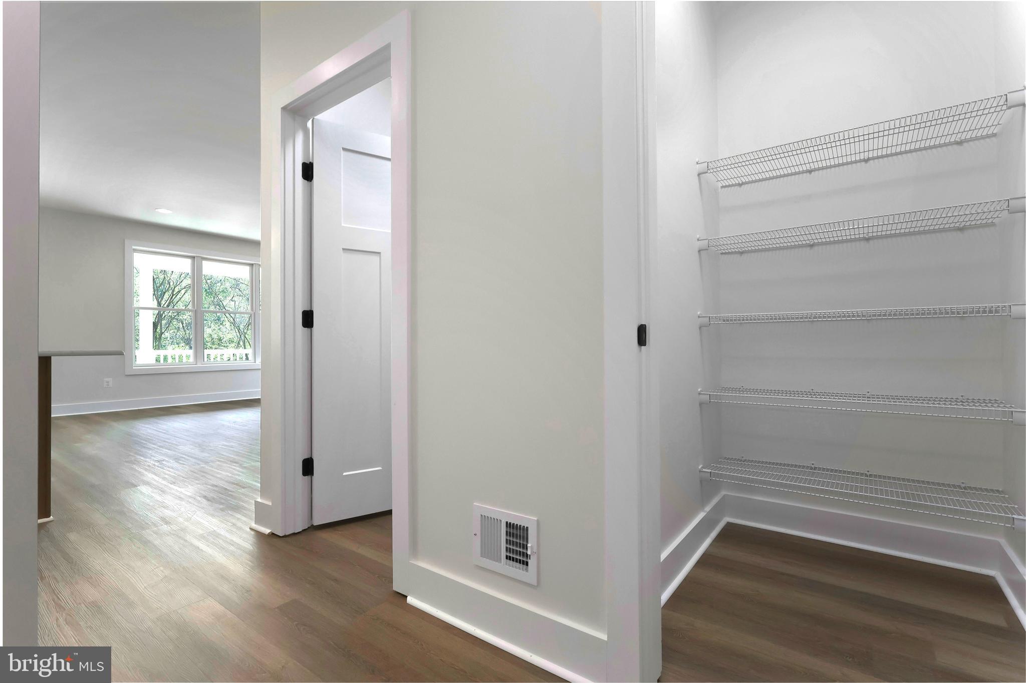 23131 Meadow Road Bushwood, MD 20618 - Photo 39 of 42 a view of an empty walk in closet