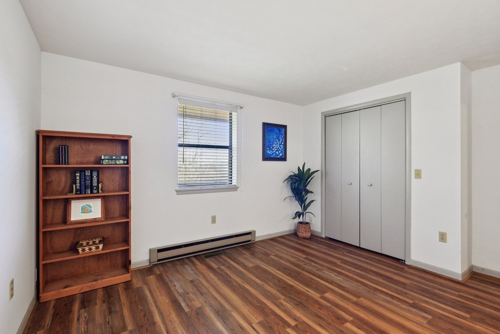 115 South Codrington Kerrville, TX 78028 - Photo 13 of 33 a view of empty room with wooden floor and closet