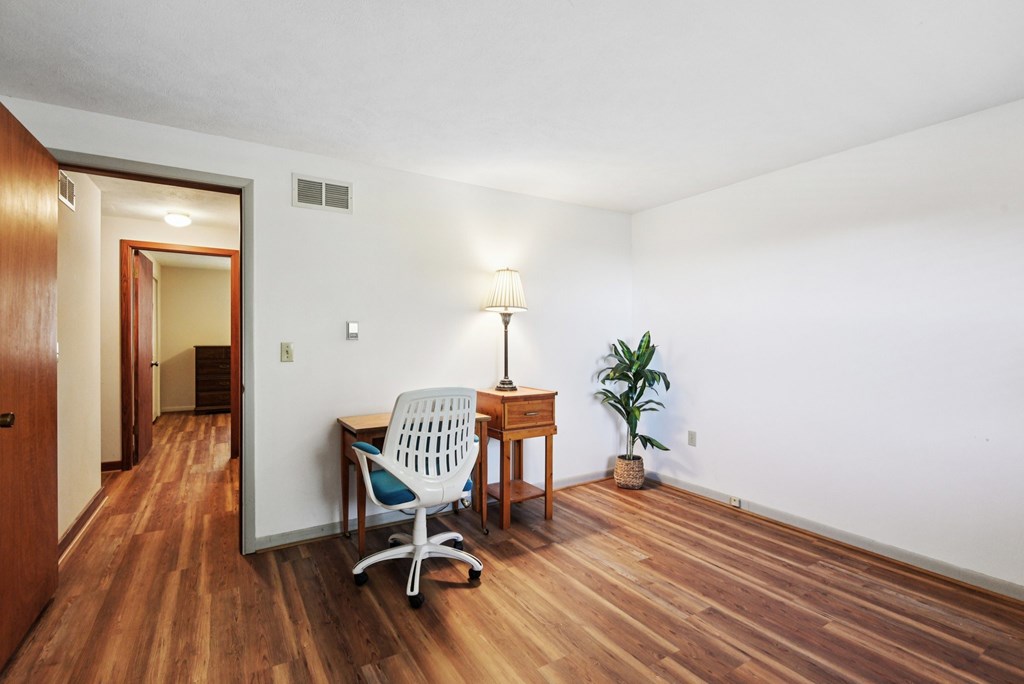 115 South Codrington Kerrville, TX 78028 - Photo 14 of 33 a dining room with furniture and wooden floor