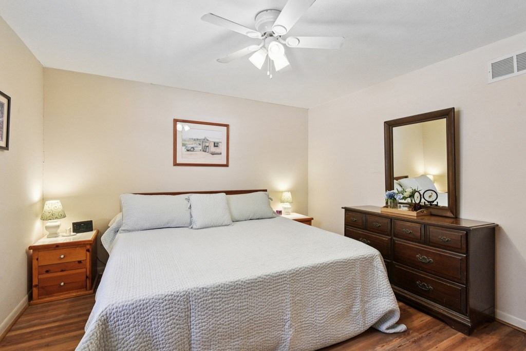 115 South Codrington Kerrville, TX 78028 - Photo 18 of 33 a bedroom with a bed and a dresser