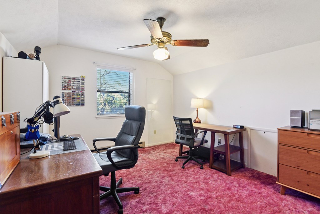 115 South Codrington Kerrville, TX 78028 - Photo 22 of 33 a view of a workspace with furniture and a window