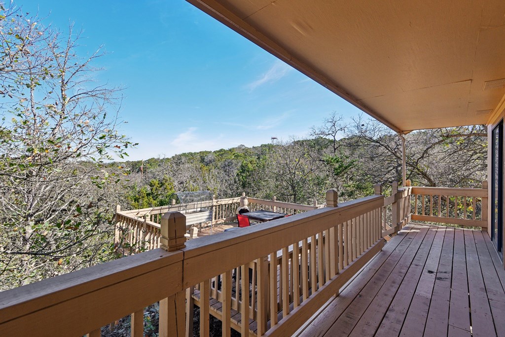 115 South Codrington Kerrville, TX 78028 - Photo 24 of 33 a view of a balcony with wooden fence