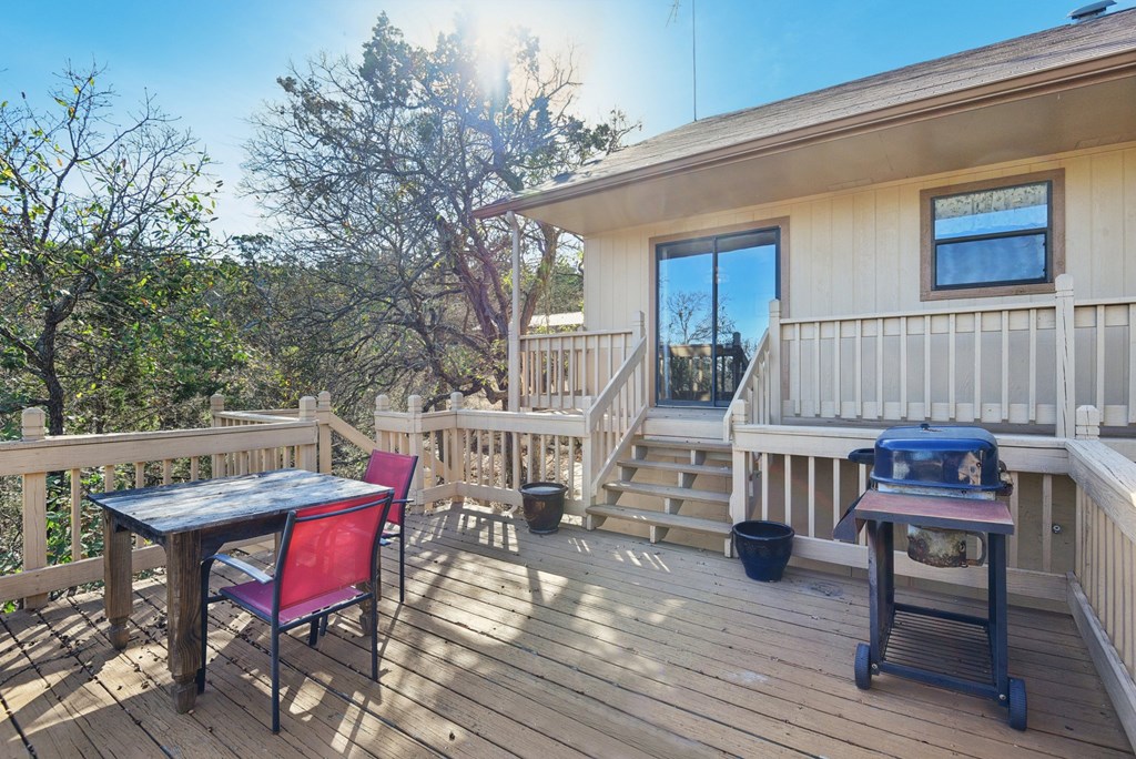 115 South Codrington Kerrville, TX 78028 - Photo 28 of 33 a view of a house with a table and chairs in patio