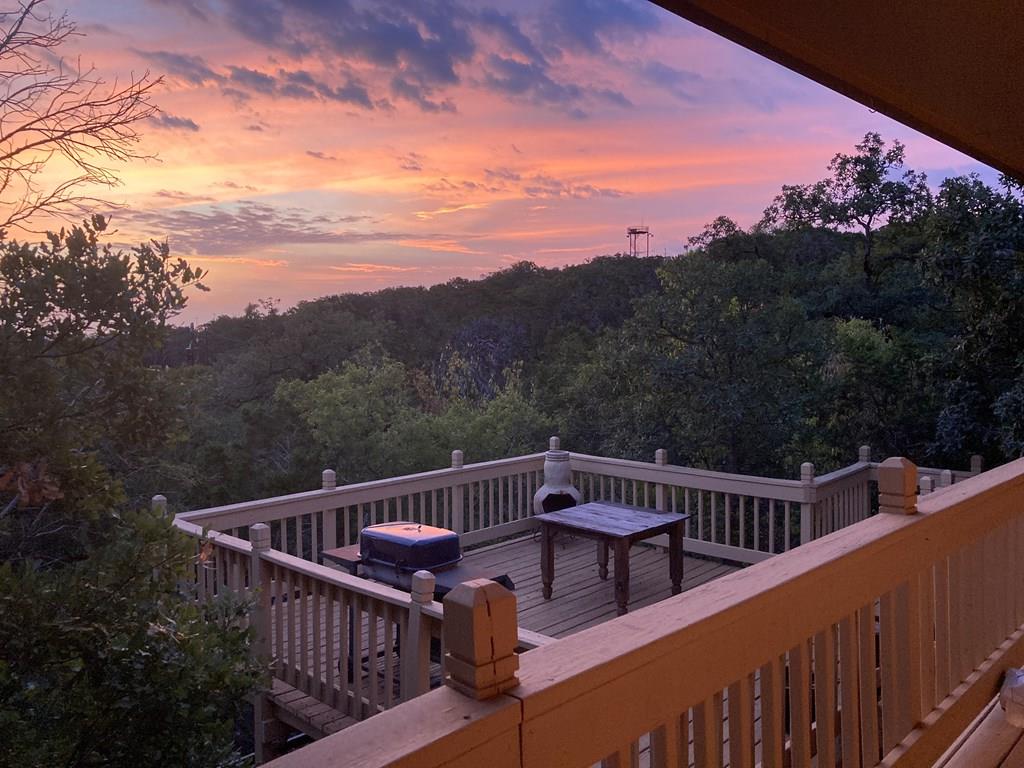 115 South Codrington Kerrville, TX 78028 - Photo 29 of 33 a view of balcony with wooden fence and trees