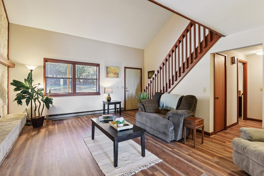 115 South Codrington Kerrville, TX 78028 - Photo 3 of 33 a living room with furniture and a wooden floor