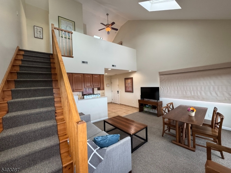 3 Telemark Drive, Unit 12 Vernon, NJ 07462 - Photo 4 of 14 a living room with furniture and a fireplace