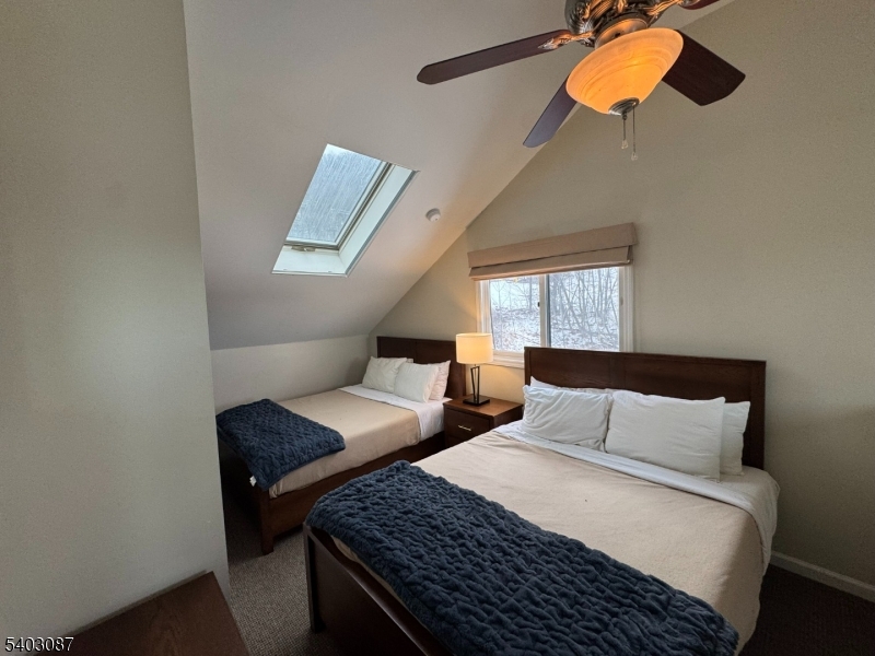 3 Telemark Drive, Unit 12 Vernon, NJ 07462 - Photo 9 of 14 a bedroom with a bed and window