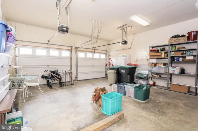 a room with lots of furniture and clutter