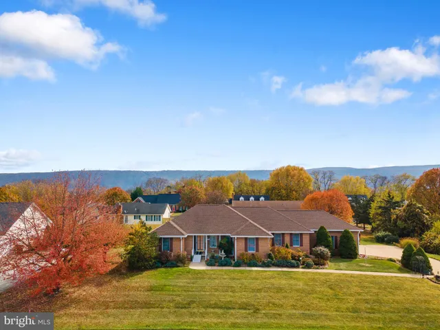 a front view of a house with a ocean view