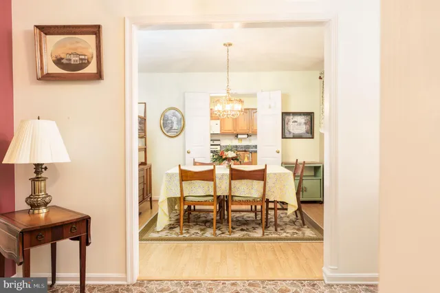 a view of a room with furniture and window