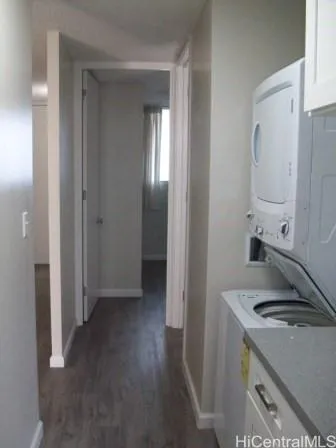 a kitchen with a refrigerator and a stove