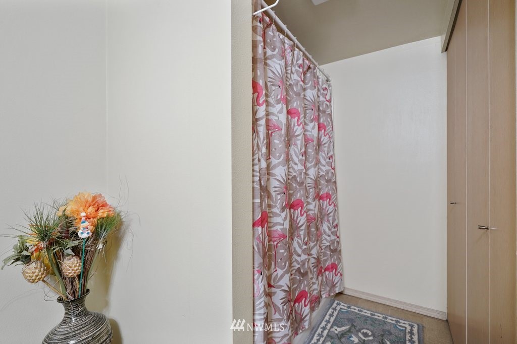 10709 Valley View Road, Unit A105 Bothell, WA 98011 - Photo 24 of 26 a vase of flowers sitting on a table