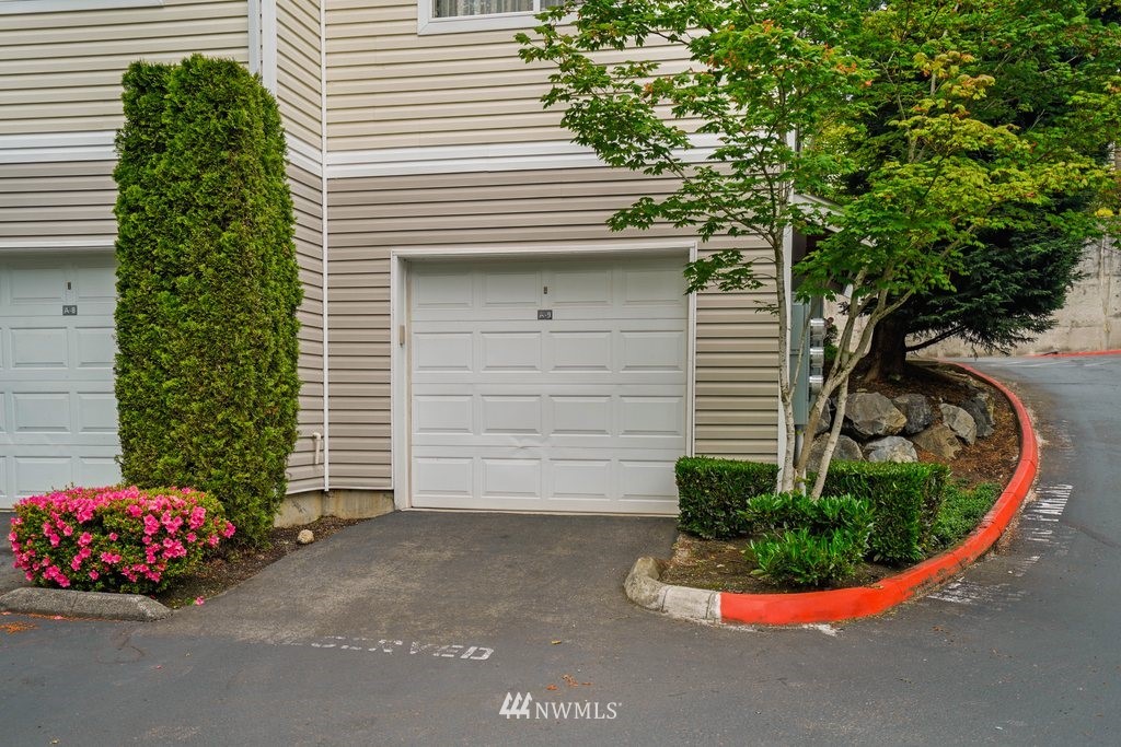 10709 Valley View Road, Unit A105 Bothell, WA 98011 - Photo 25 of 26 a front view of a house with a garden
