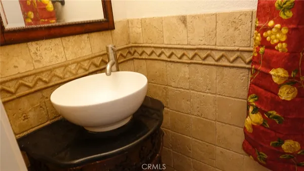 a close view of a sink and mirror