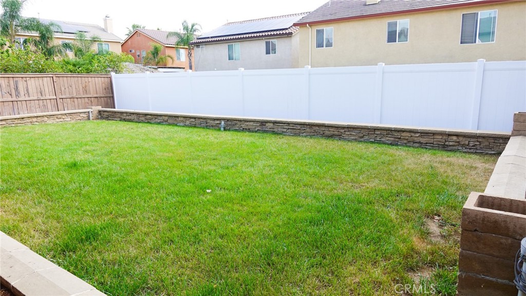 1415 Sunflower Way Perris, CA 92571 - Photo 29 of 39 a view of backyard with small cabin