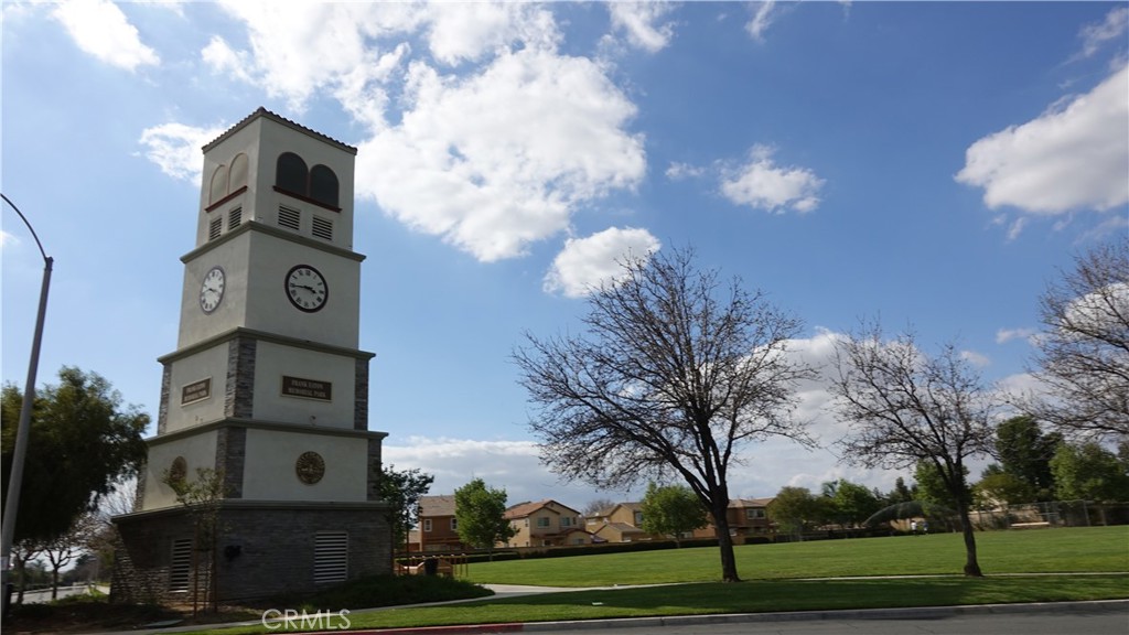 1415 Sunflower Way Perris, CA 92571 - Photo 37 of 39 a front view of a house with a yard
