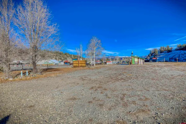 a view of outdoor space and car parked