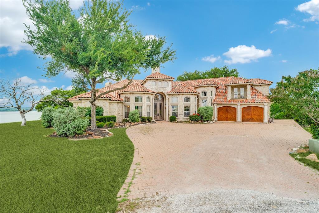 1237 Overlook Court Whitney, TX 76692 - Photo 1 of 20 a front view of a house with a yard