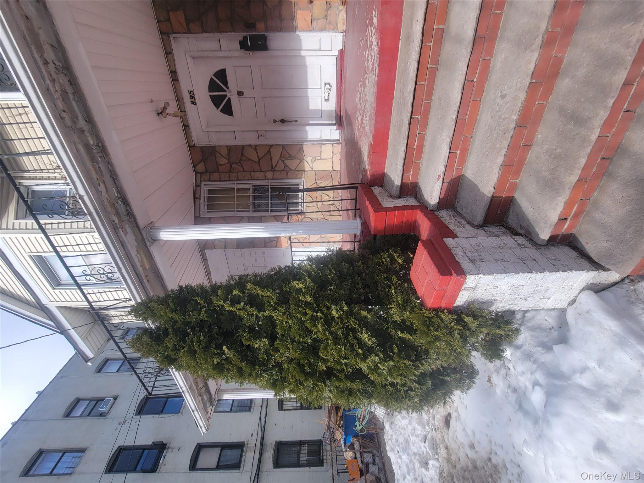 895 Lenox Road Brooklyn, NY 11203 - Photo 6 of 8 a view of a building with sitting area