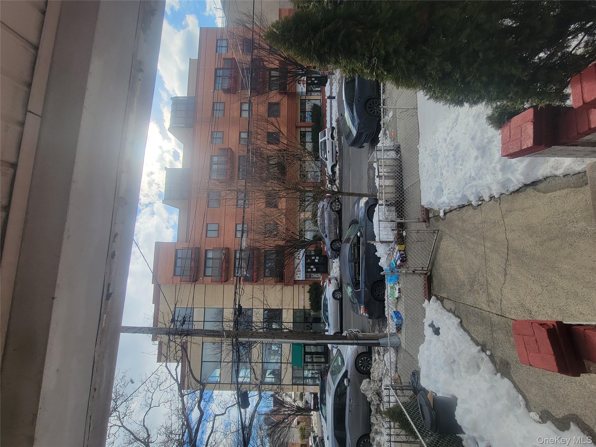 895 Lenox Road Brooklyn, NY 11203 - Photo 7 of 8 a city view with lot of car parked