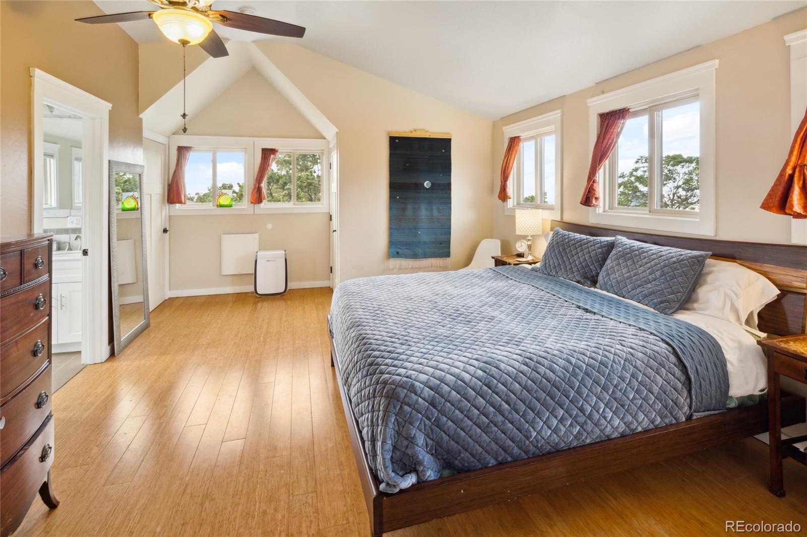 147 Moonlight Way Crestone, CO 81131 - Photo 21 of 47 a bedroom with a bed and a large window