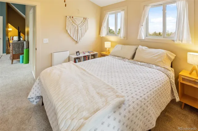 a en suite bathroom with a sink and a window
