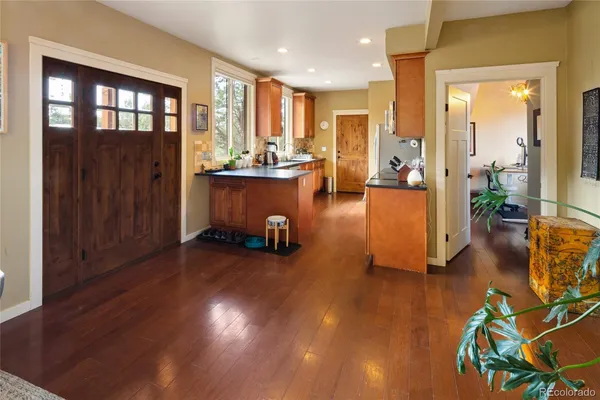a view of a living room and dining room