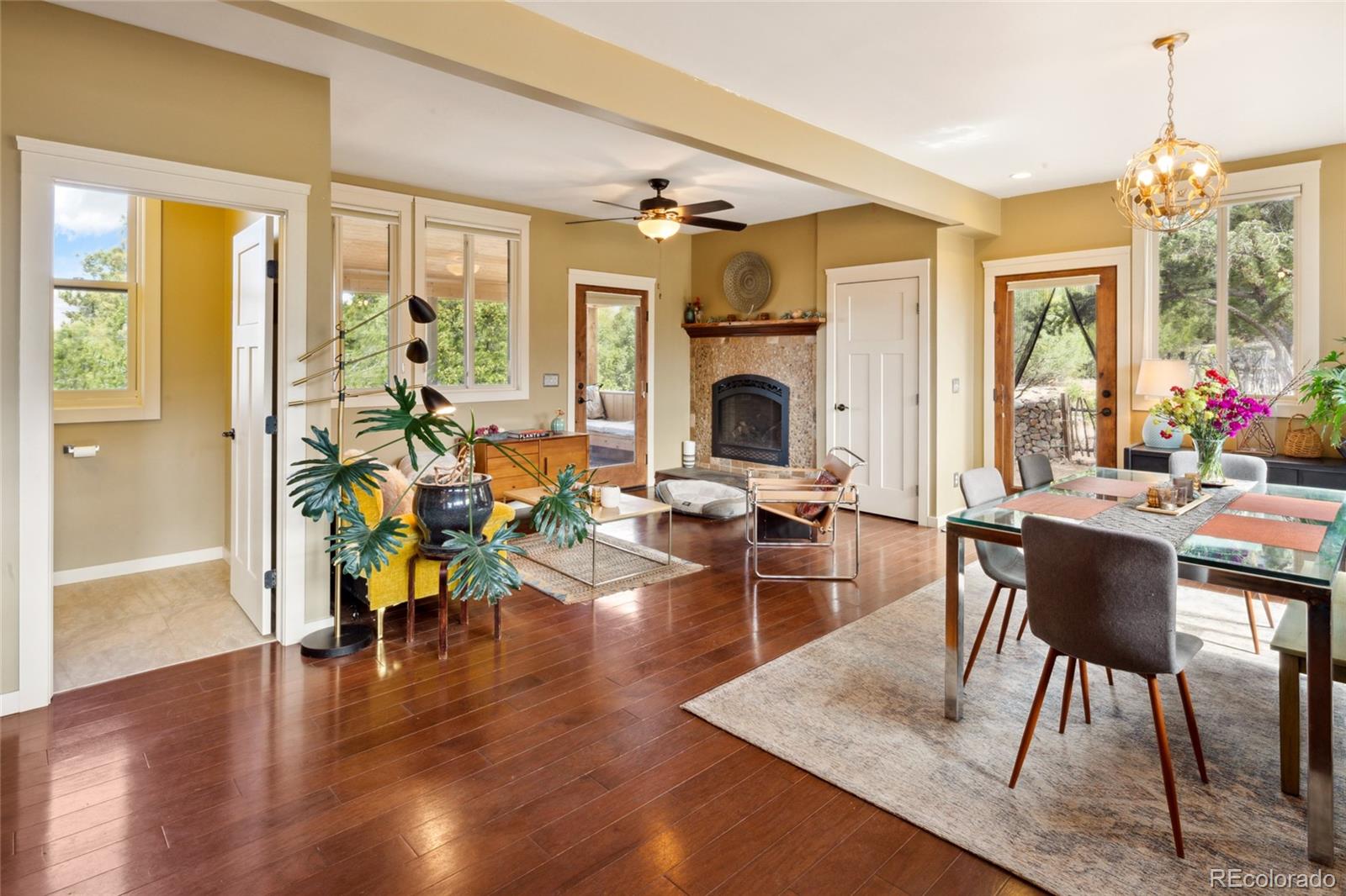 147 Moonlight Way Crestone, CO 81131 - Photo 7 of 47 a view of a dining room with furniture window and wooden floor