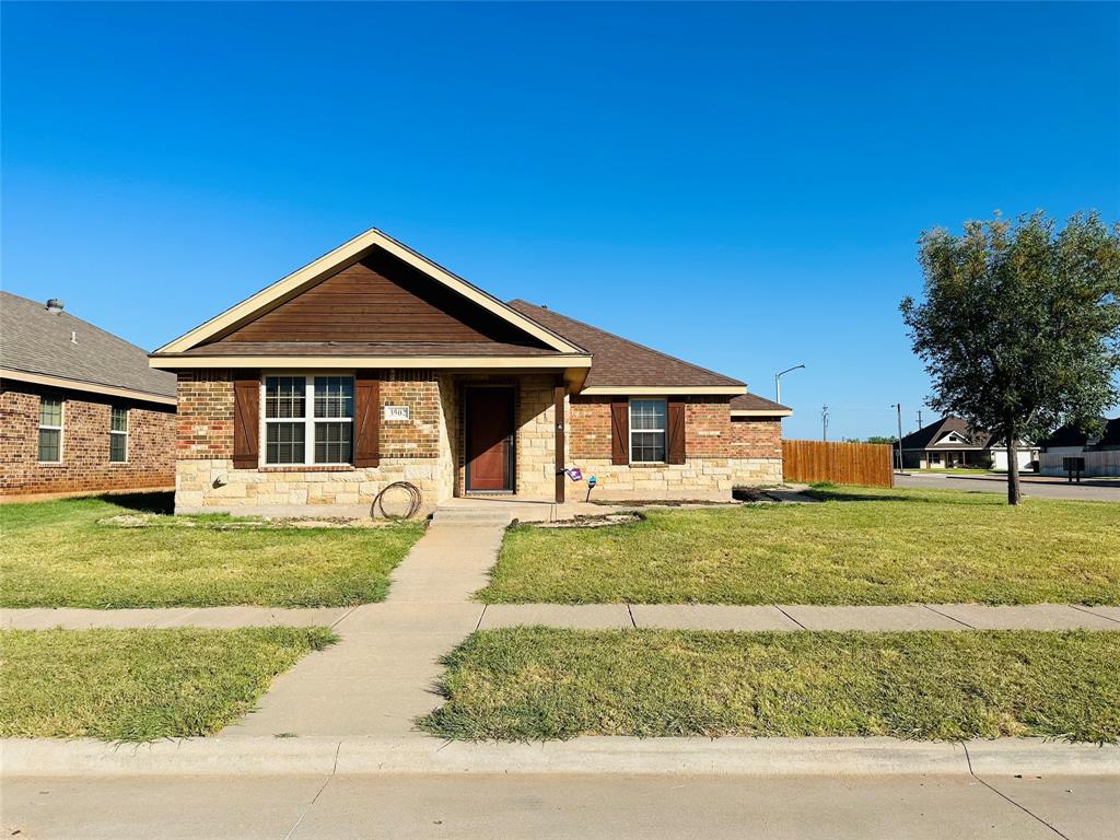 3502 Firedog Road Abilene, TX 79606 - Photo 1 of 1 a front view of a house with a yard
