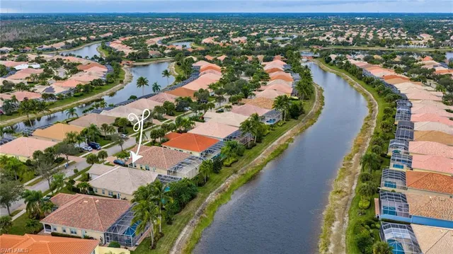 an aerial view of a city with lots of residential buildings