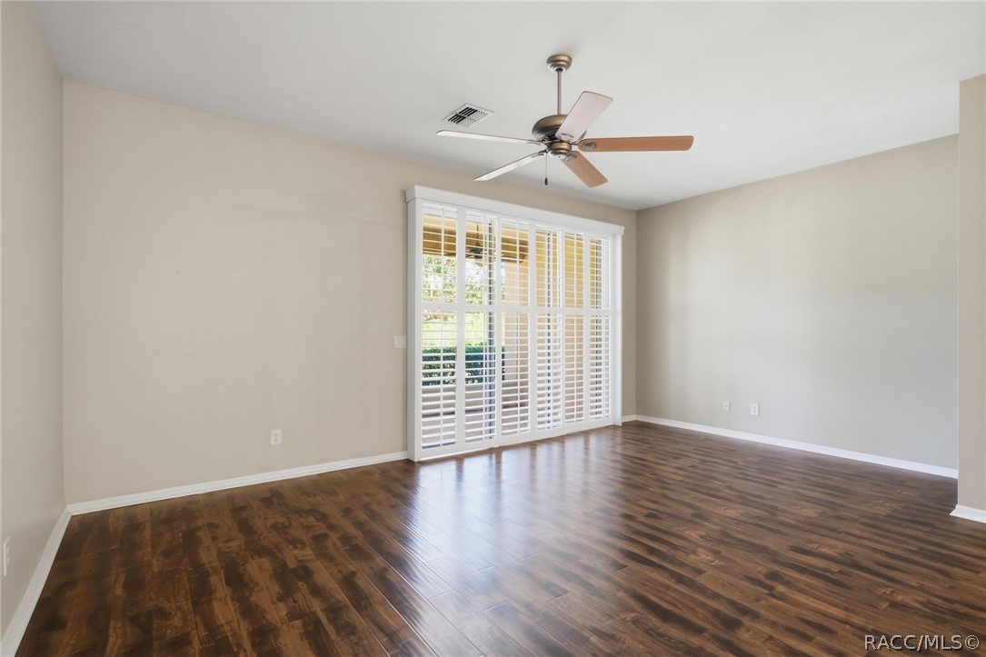 1598 West Spring Meadow Loop Lecanto, FL 34461 - Photo 7 of 74 Open Main Level Living & Dining Areas To Outdoor Living