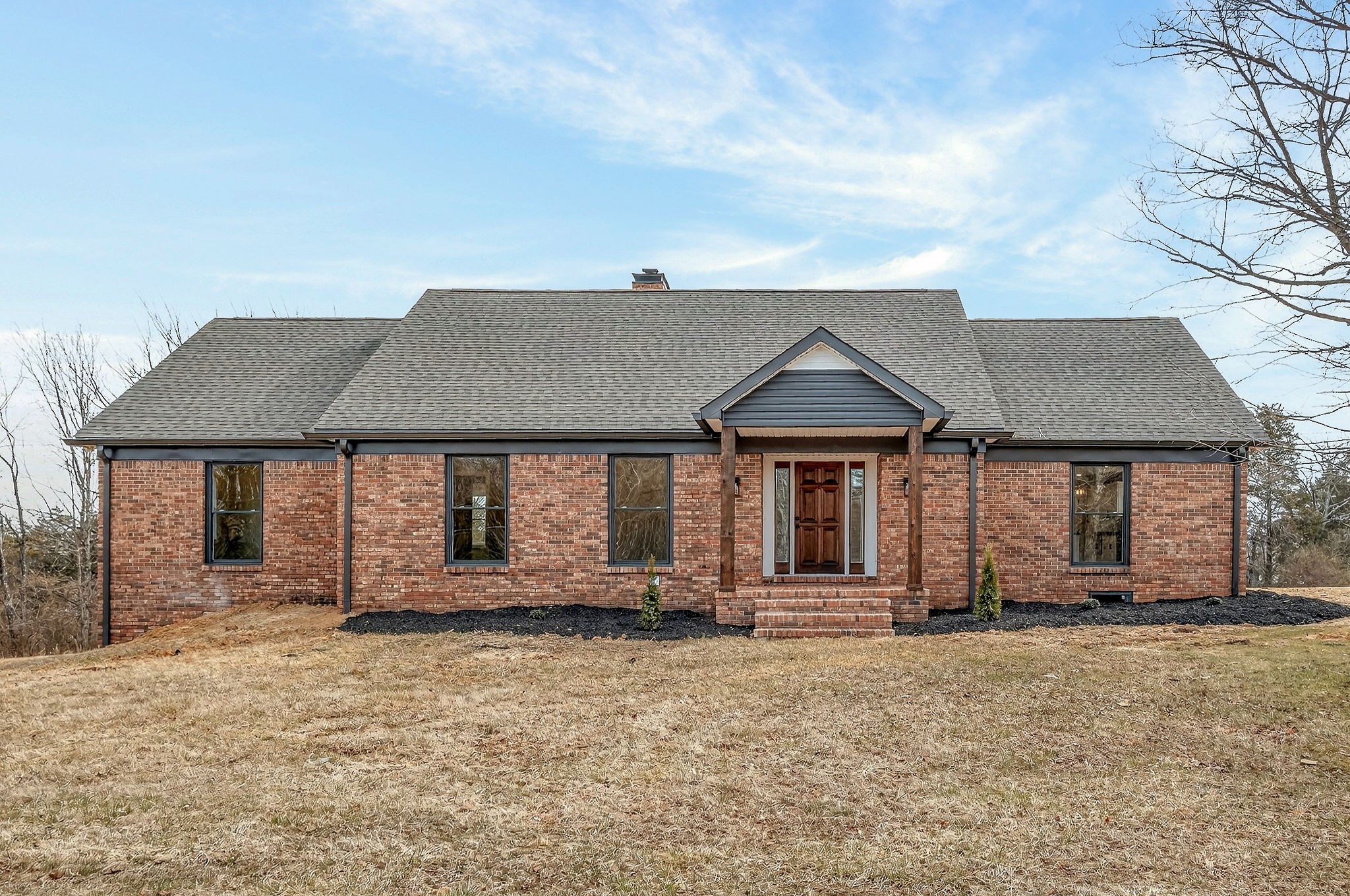698 Mike Muncey Road McMinnville, TN 37110 - Photo 1 of 71 front view of a house with a yard