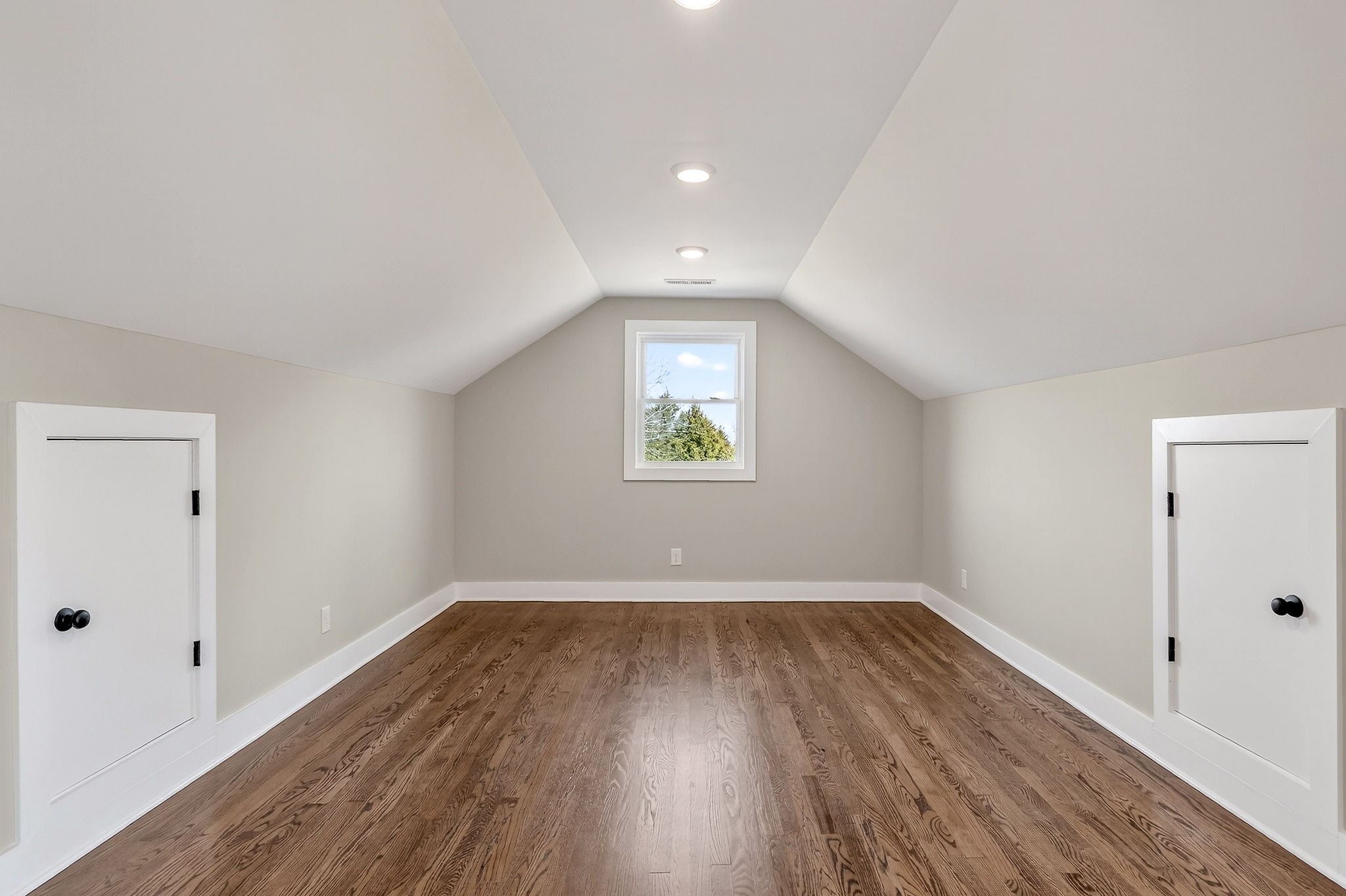 698 Mike Muncey Road McMinnville, TN 37110 - Photo 38 of 71 wooden floor in an empty room with a window