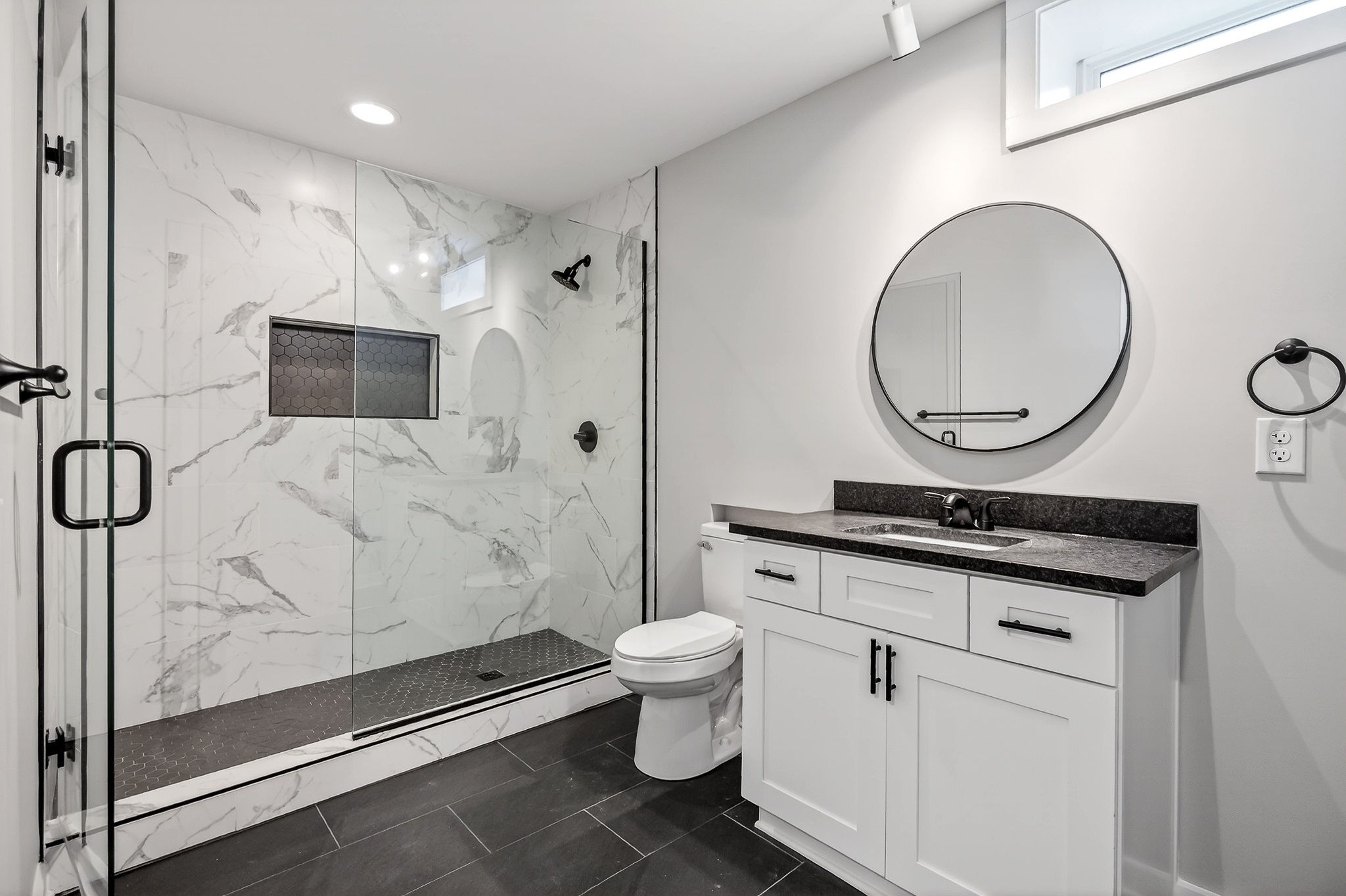 698 Mike Muncey Road McMinnville, TN 37110 - Photo 46 of 71 a bathroom with a toilet a sink and a mirror