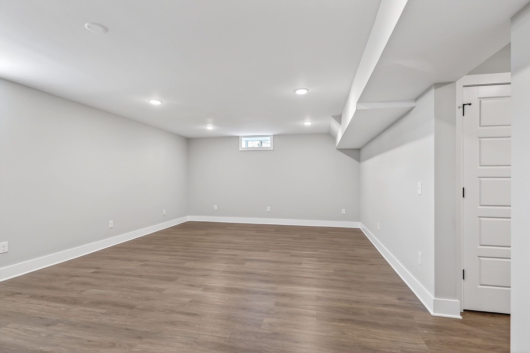 698 Mike Muncey Road McMinnville, TN 37110 - Photo 48 of 71 wooden floor in an empty room with a window