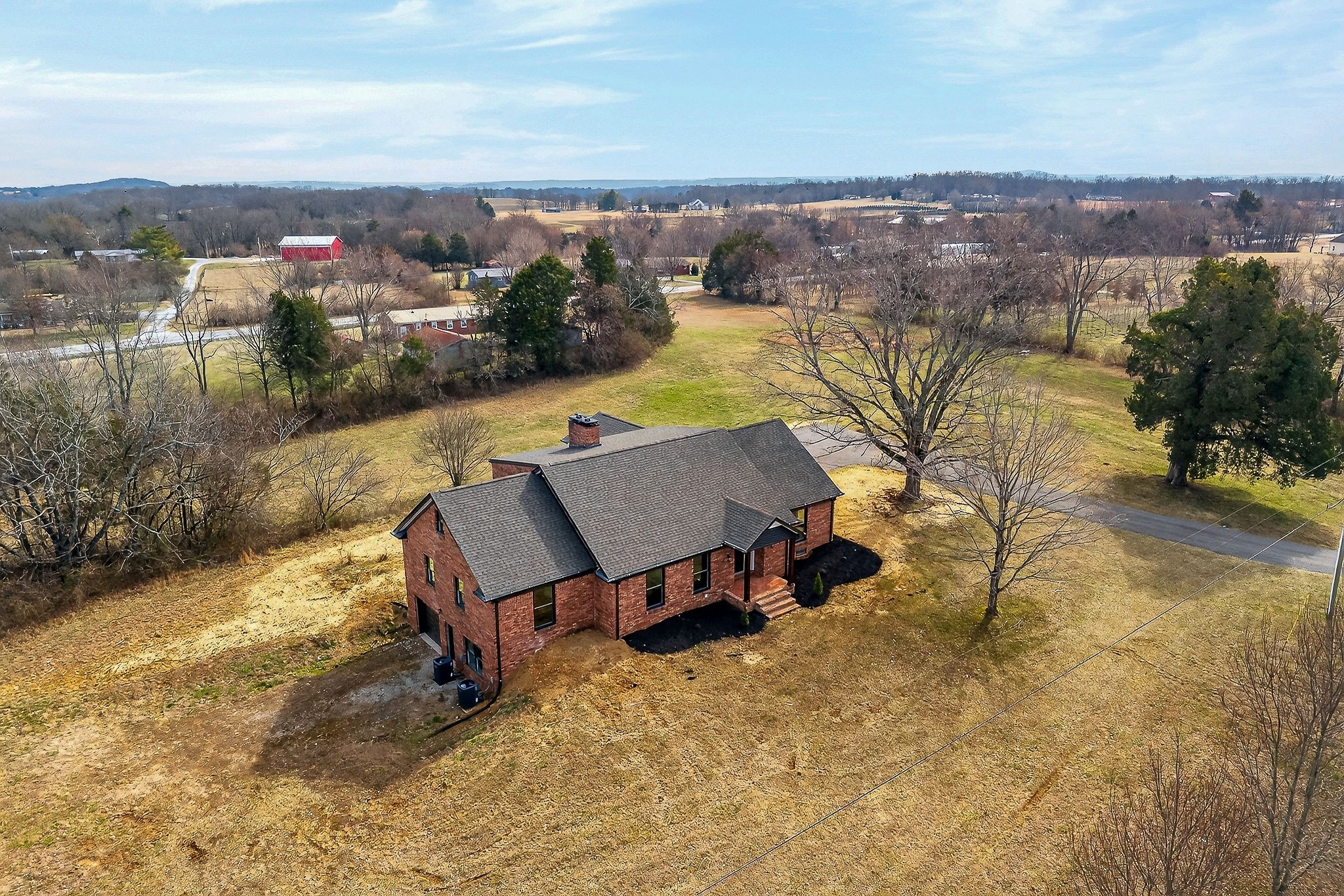698 Mike Muncey Road McMinnville, TN 37110 - Photo 59 of 71 an aerial view of a house with a yard and lake view