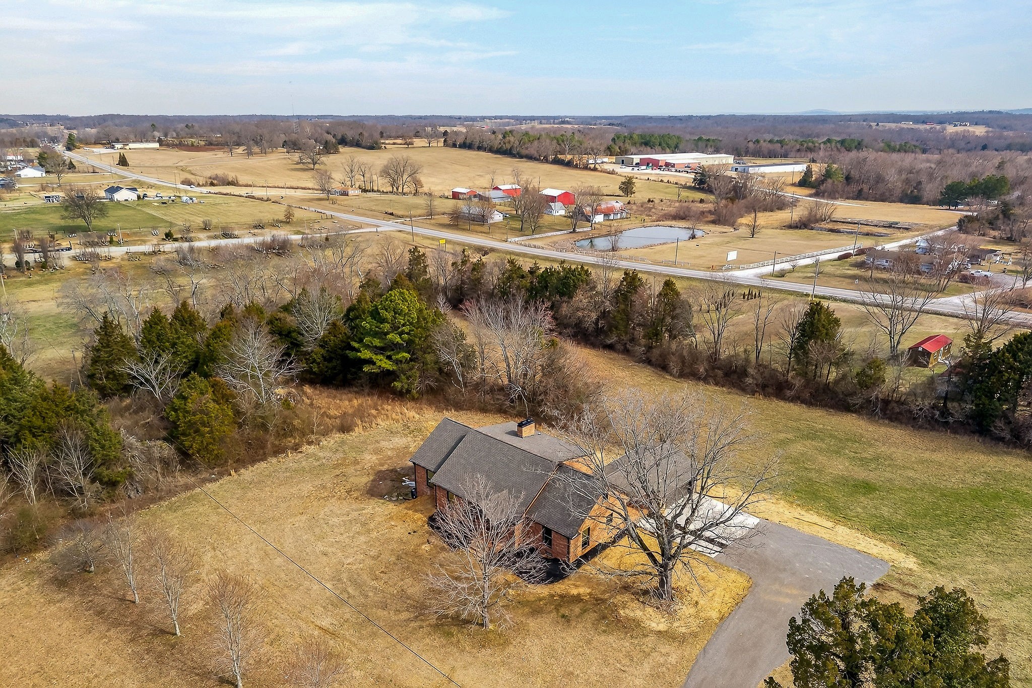 698 Mike Muncey Road McMinnville, TN 37110 - Photo 60 of 71 an aerial view of ocean and residential houses with outdoor space