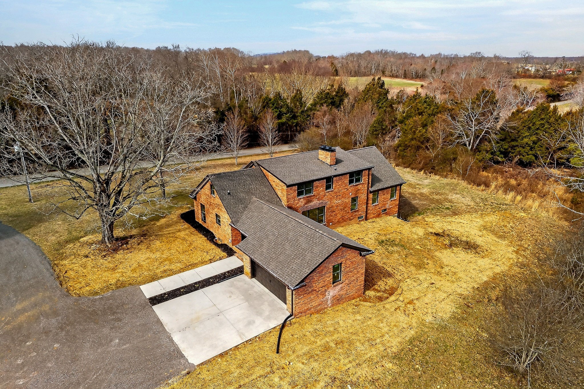 698 Mike Muncey Road McMinnville, TN 37110 - Photo 61 of 71 aerial view of a house with a yard and mountain