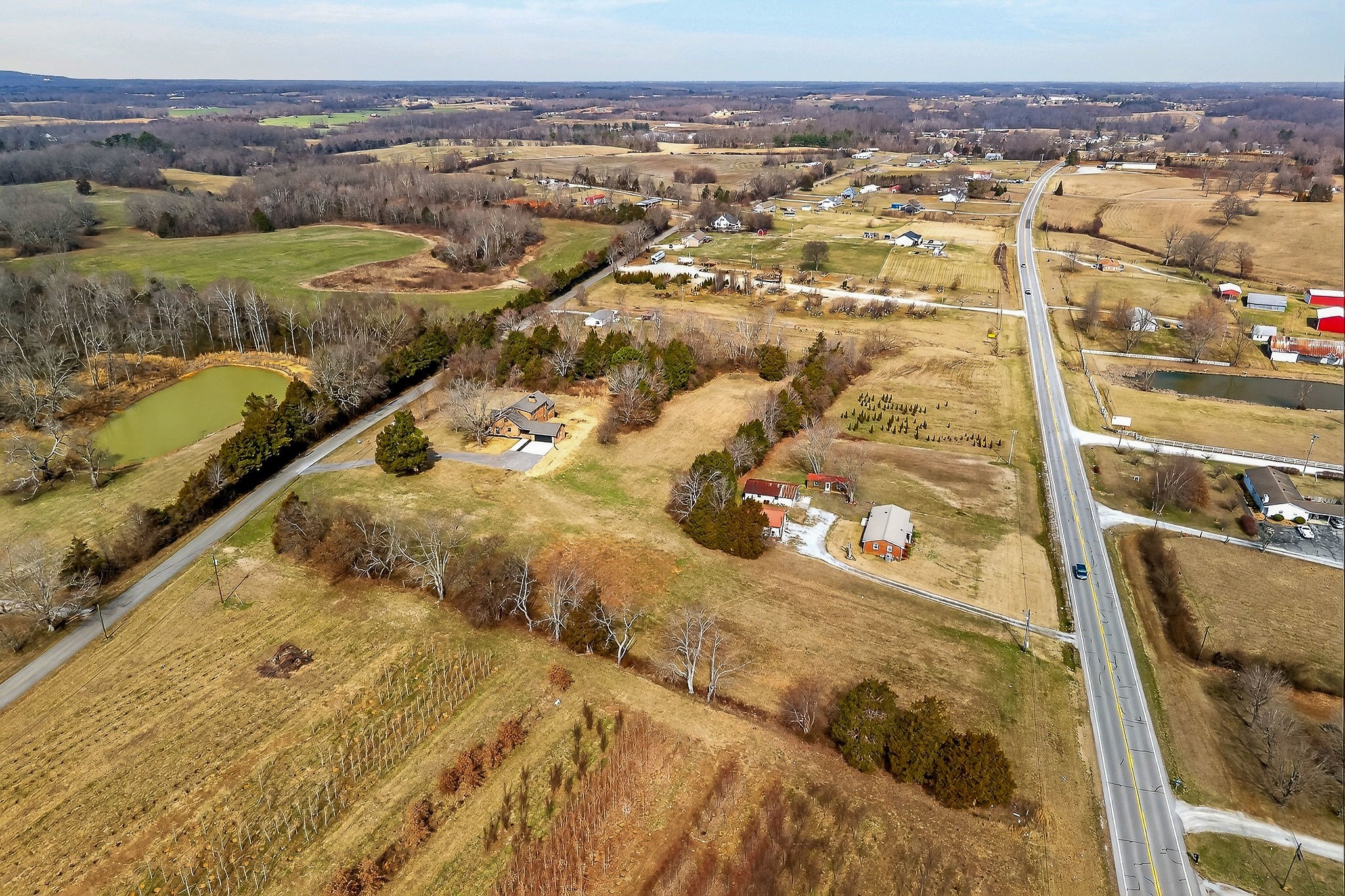 698 Mike Muncey Road McMinnville, TN 37110 - Photo 65 of 71 an aerial view of residential houses with outdoor space