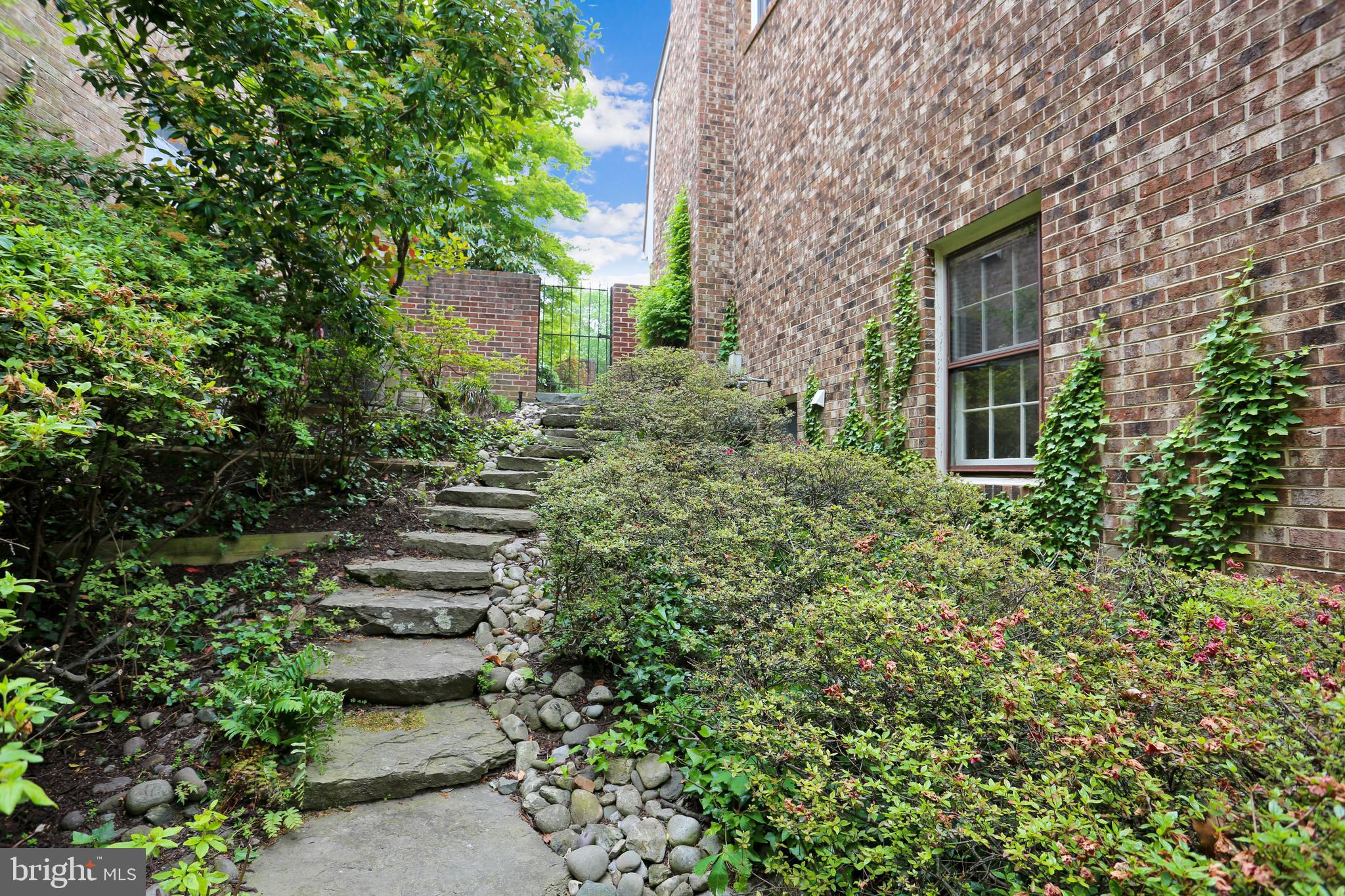 4412 Boxwood Road Bethesda, MD 20816 - Photo 24 of 77 Side yard with stone steps to patio