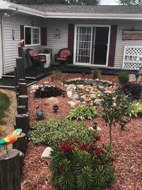 4800 9 Mile Road Remus, MI 49340 - Photo 4 of 37 Flower garden/Fountain