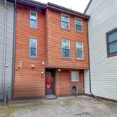 a view of a house with backyard