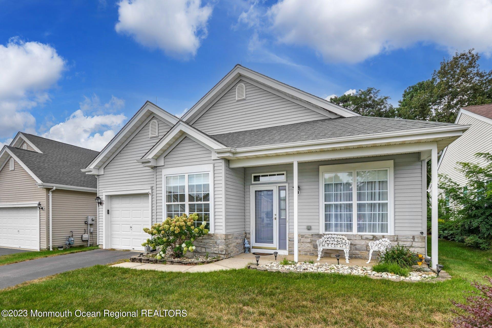 54 Sandpiper Road Barnegat, NJ 08005 - Photo 1 of 27 front view of a house with a yard