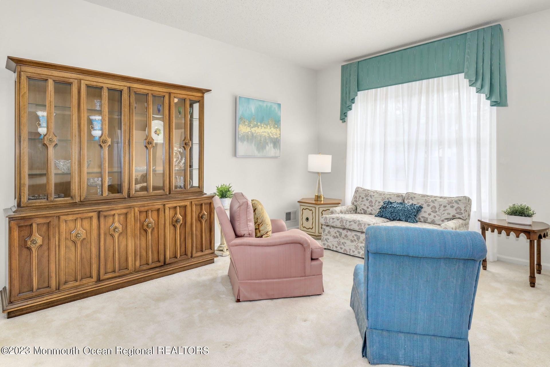54 Sandpiper Road Barnegat, NJ 08005 - Photo 2 of 27 a living room with furniture and a large window