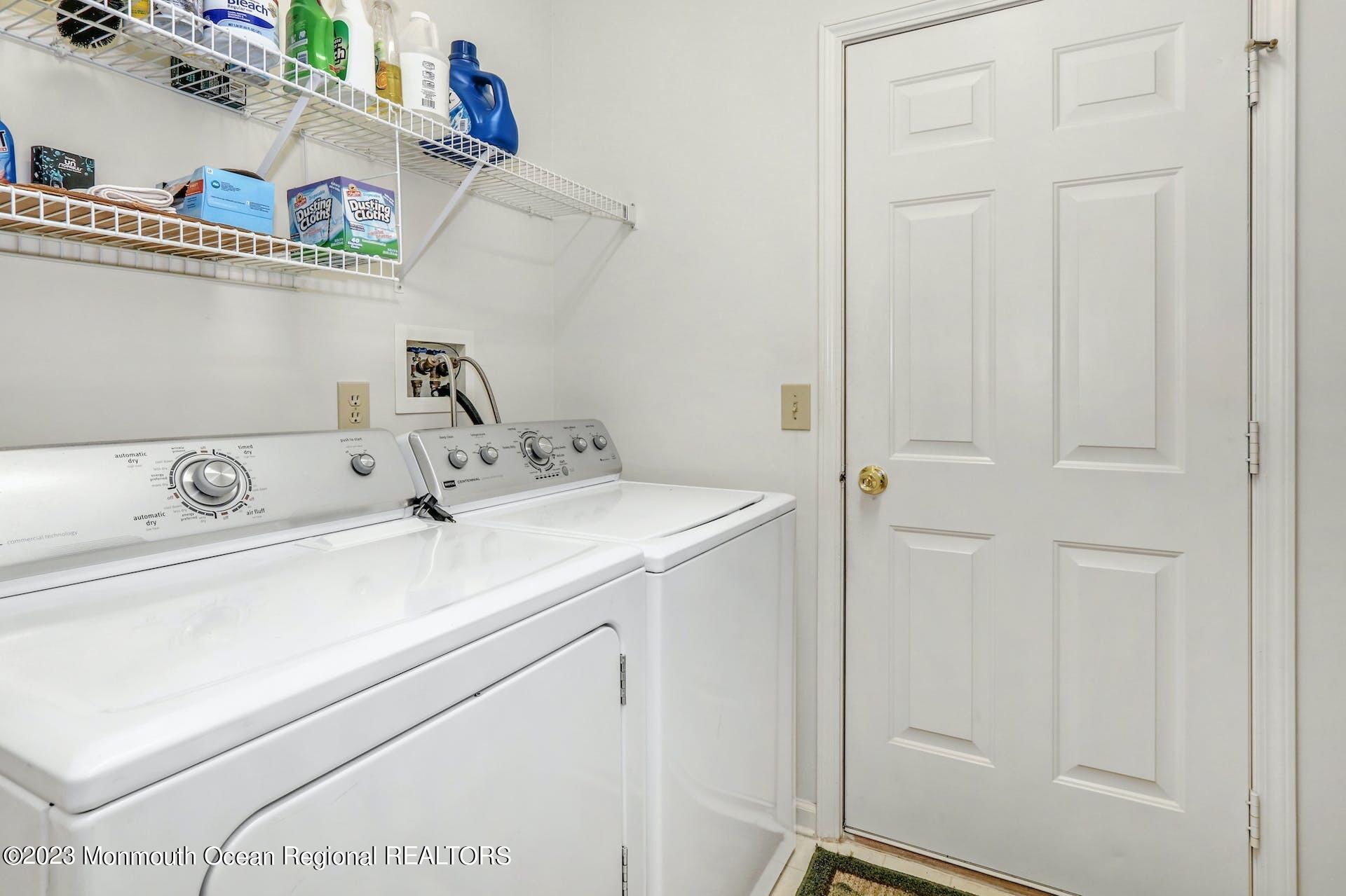 54 Sandpiper Road Barnegat, NJ 08005 - Photo 25 of 27 a utility room with dryer and washer