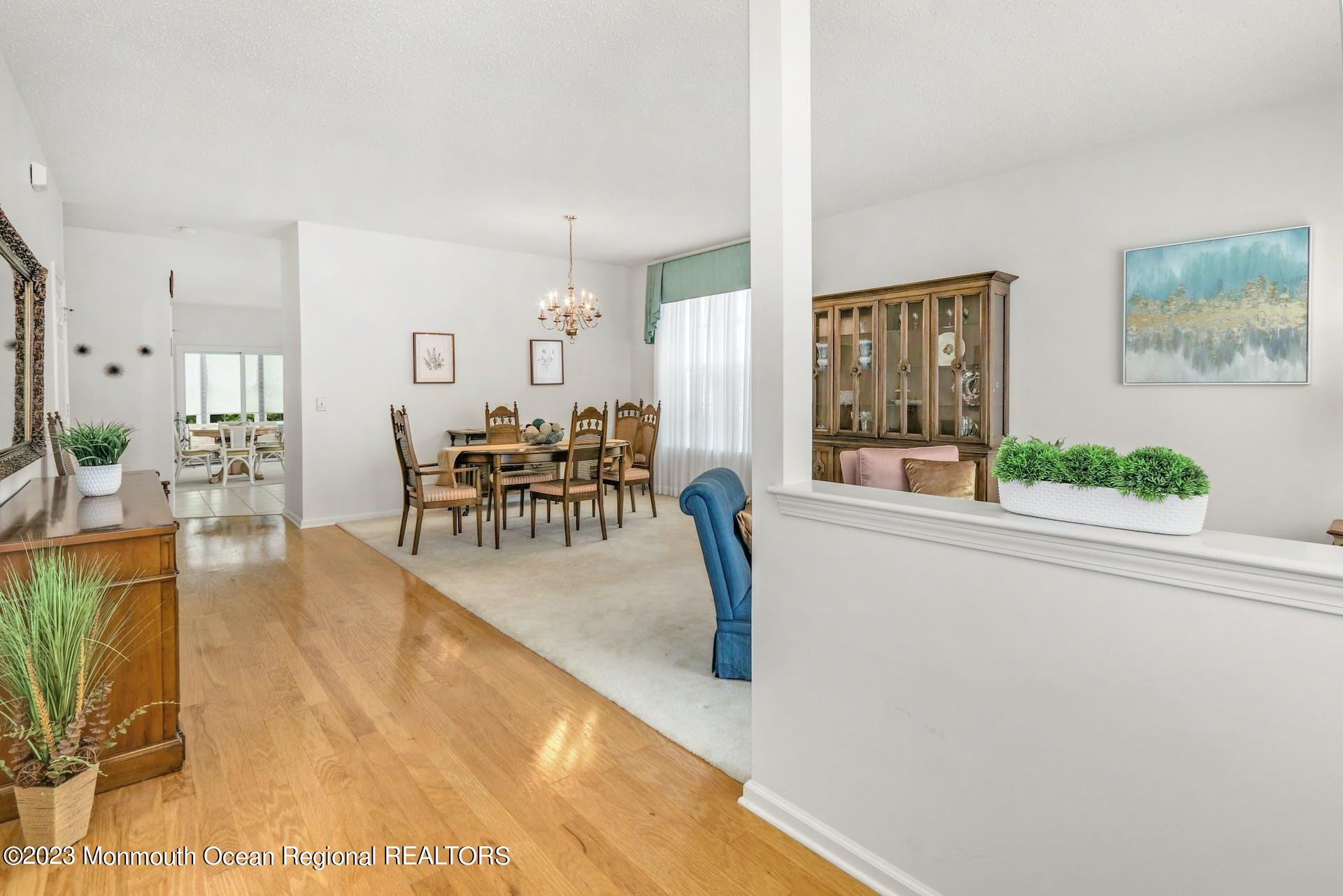 54 Sandpiper Road Barnegat, NJ 08005 - Photo 4 of 27 a dining room with furniture and wooden floor