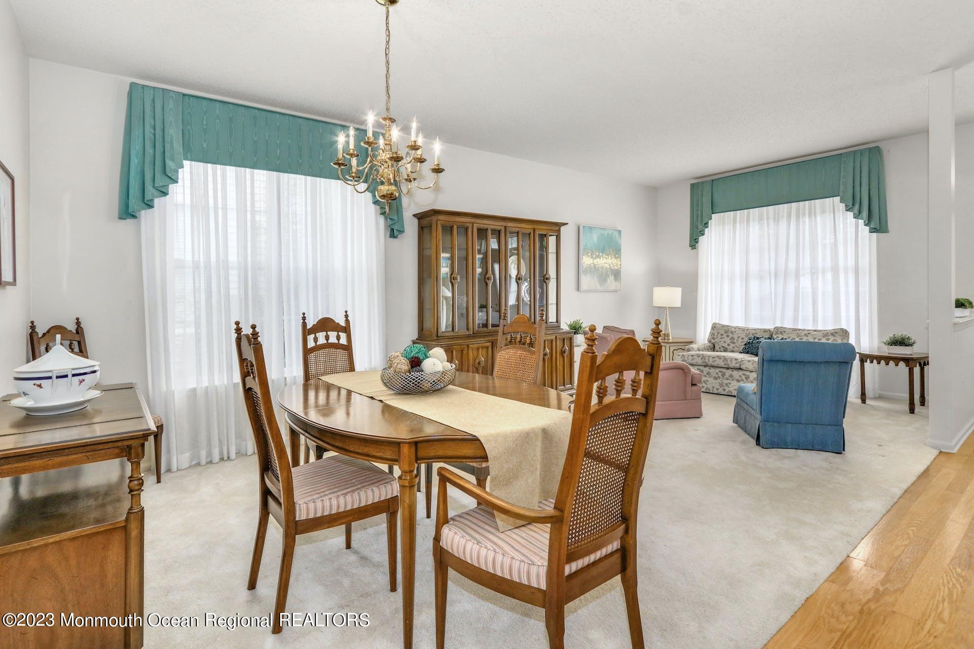 54 Sandpiper Road Barnegat, NJ 08005 - Photo 6 of 27 a view of a dining room with furniture